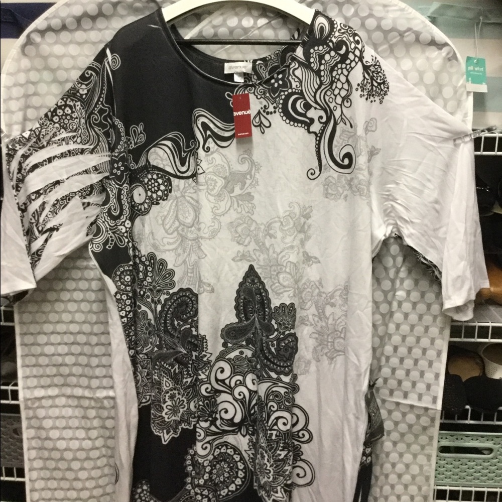 Casual dress, white with black print.